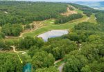 Aerial view of golf course, Lookout Mountain, and the lake right next to Cabin. 